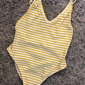 striped yellow bodysuit